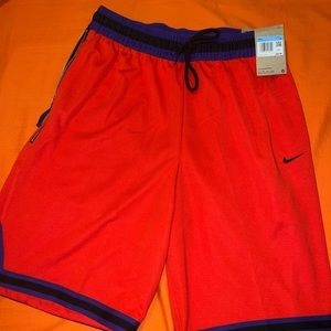 Nike basketball shorts size medium colors red